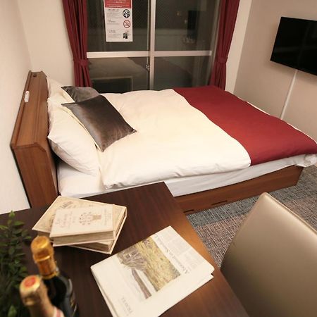 Апарт отель Sky Garden Hakata Фукуока Экстерьер фото